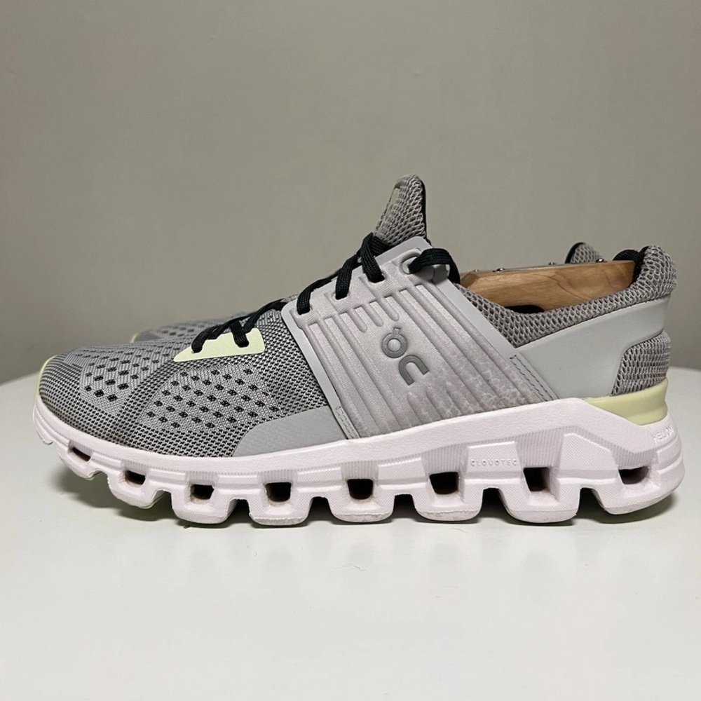 On Running Gray and White Athletic Shoes